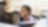 Smiling African businesswoman sitting at desk